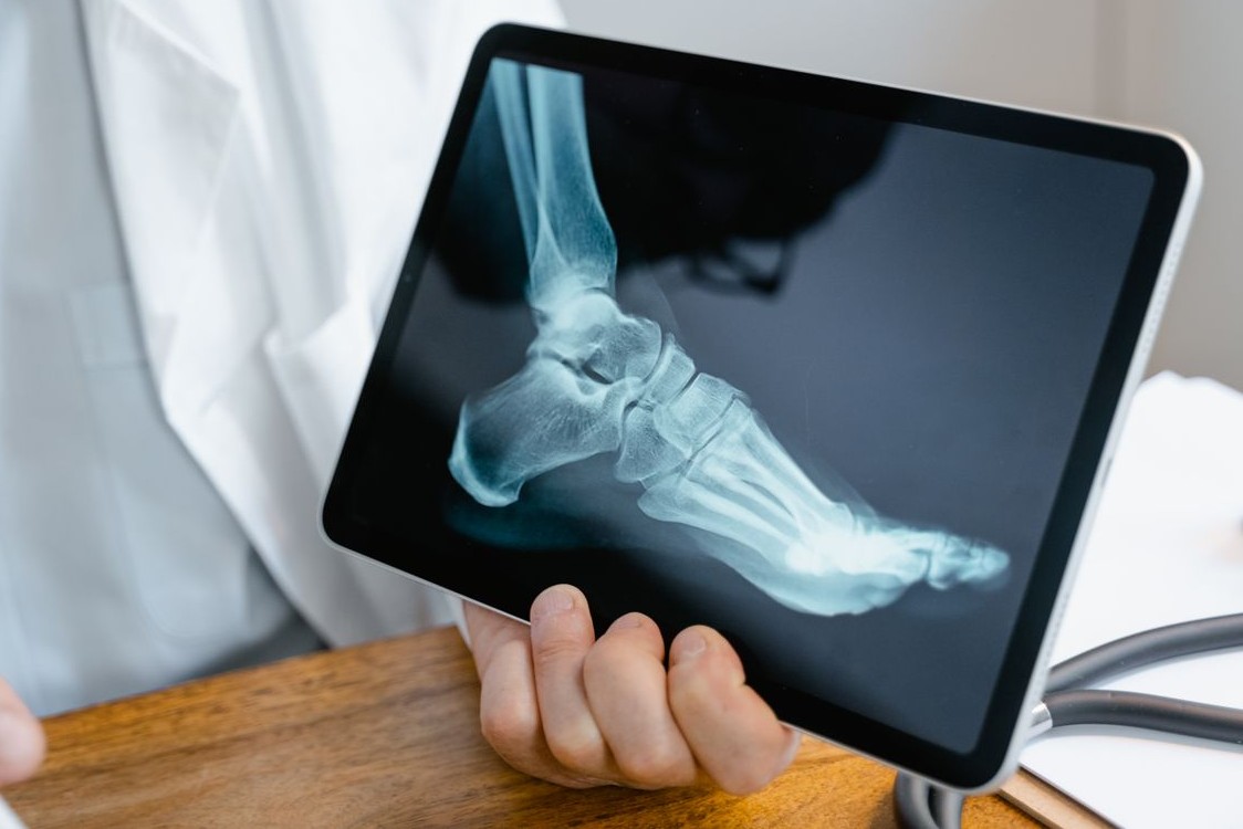 Podiatrist examining a patient's foot at BSS Healthcare International